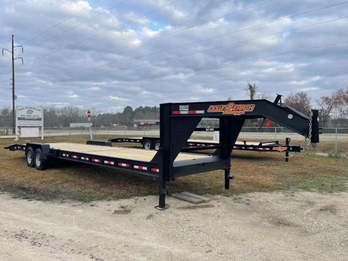 New 2023 Down 2 Earth Trailers 82x34 GN Car Hauler. Car Hauler