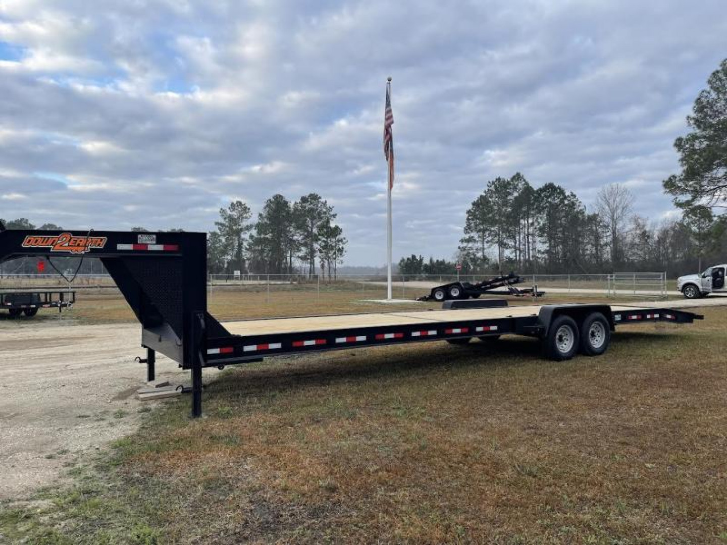 New 2023 Down 2 Earth Trailers 82x34 GN Car Hauler. Car Hauler