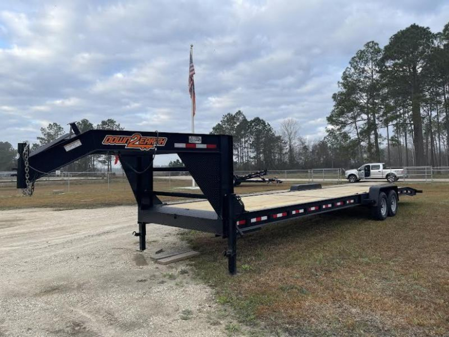 New 2023 Down 2 Earth Trailers 82x34 GN Car Hauler. Car Hauler