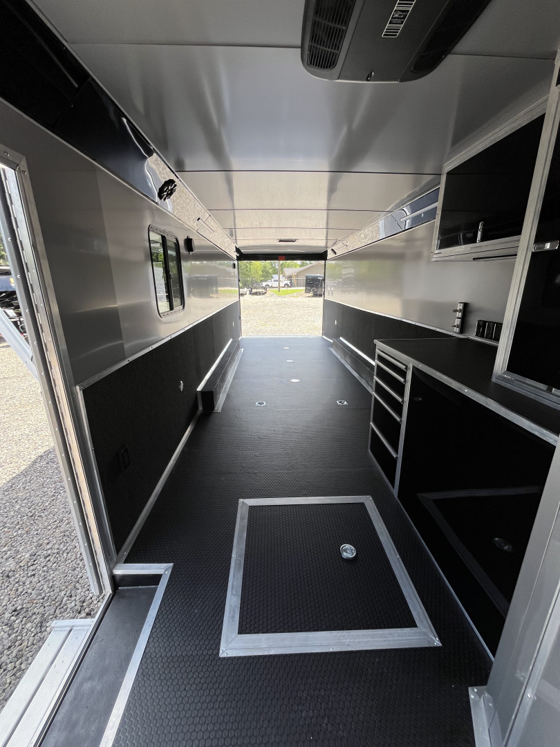 New 2026 Haulmark 34 Bathoom Race Trailer, Air Prep PKG, Awning, Polycor, Insulated, Window, 54" ALX Slide Out Step, A/C + Heat
