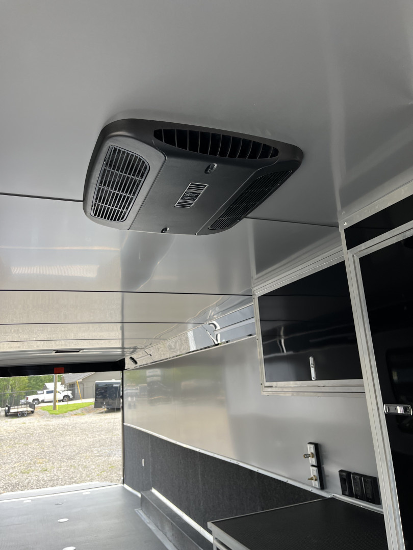 New 2026 Haulmark 34 Bathoom Race Trailer, Air Prep PKG, Awning, Polycor, Insulated, Window, 54" ALX Slide Out Step, A/C + Heat