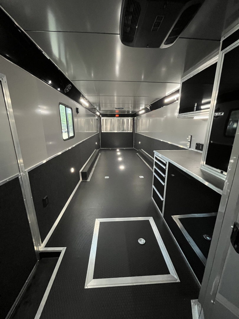 New 2026 Haulmark 34 Bathoom Race Trailer, Air Prep PKG, Awning, Polycor, Insulated, Window, 54" ALX Slide Out Step, A/C + Heat