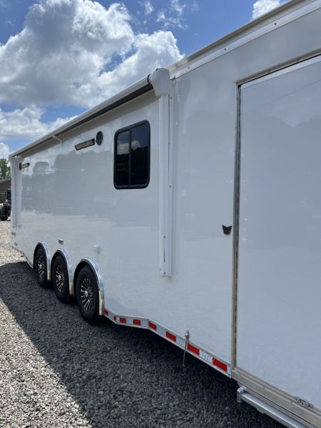 New 2026 Haulmark 34 Bathoom Race Trailer, Air Prep PKG, Awning, Polycor, Insulated, Window, 54" ALX Slide Out Step, A/C + Heat