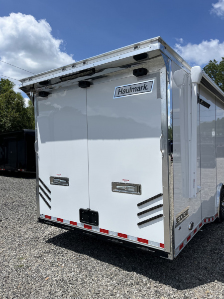 New 2026 Haulmark 34 Bathoom Race Trailer, Air Prep PKG, Awning, Polycor, Insulated, Window, 54" ALX Slide Out Step, A/C + Heat