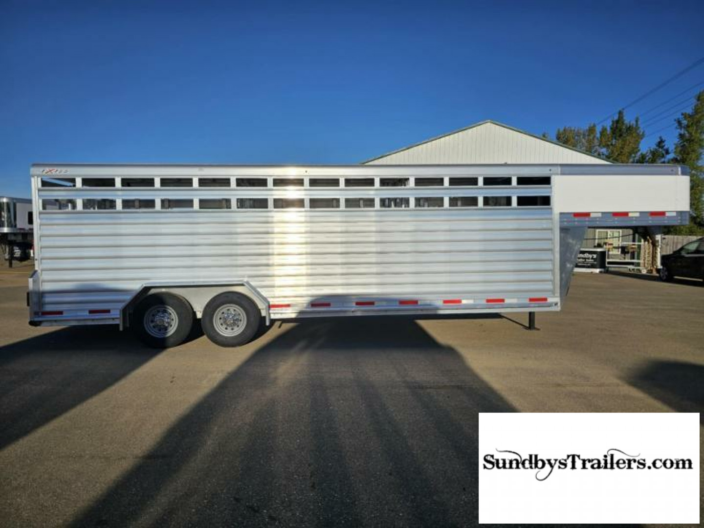 New 2025 Exiss 7x24' Stock Trailer