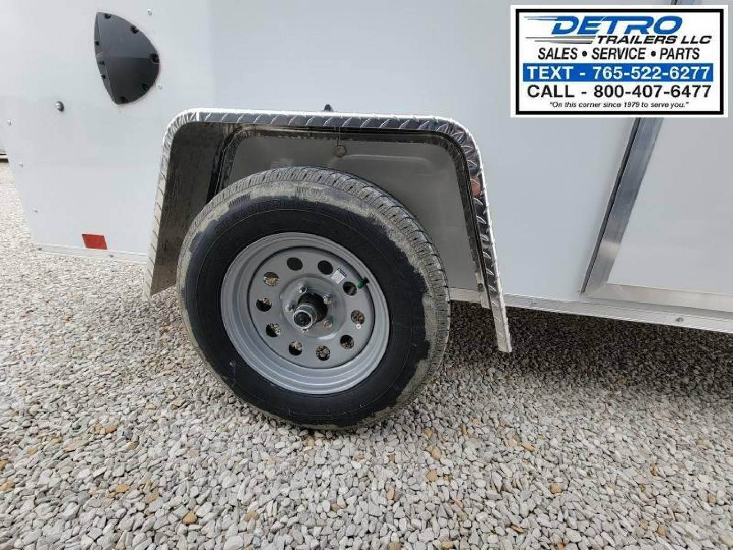 New 2023 Cargo Express DLX 6' x 10' 3K Idler Ramp Door Enclosed Cargo Trailer