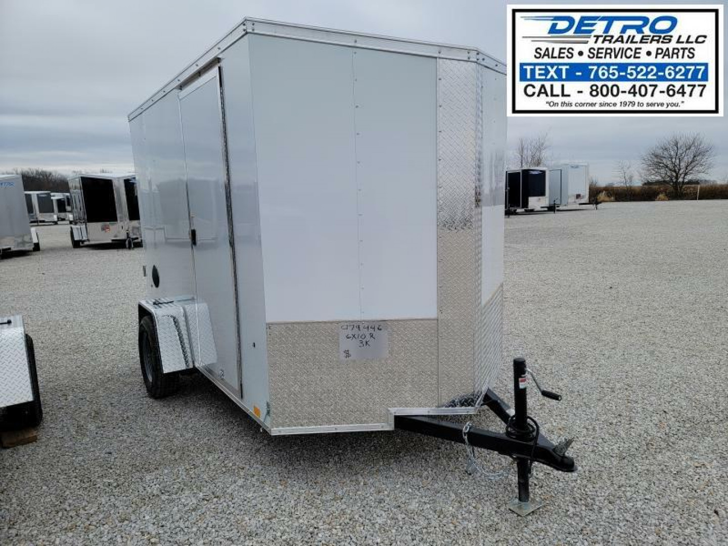 New 2023 Cargo Express DLX 6' x 10' 3K Idler Ramp Door Enclosed Cargo Trailer