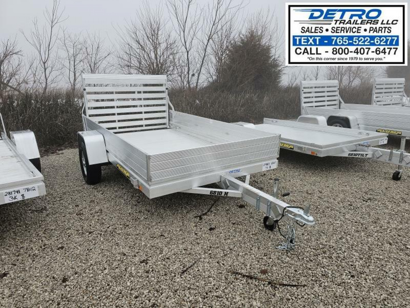 New 2024 Aluma 6810H-S-TG 3K Torsion Idler Utility Trailer
