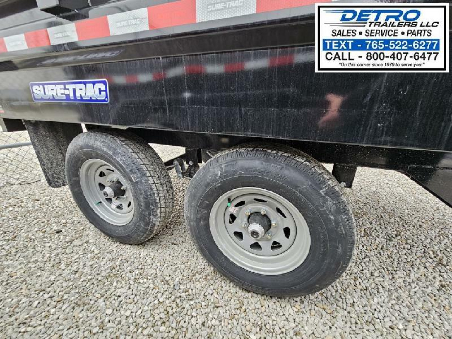 New 2024 Sure-Trac 6' x 10' 10K Single Ram SD Deckover Dump Trailer