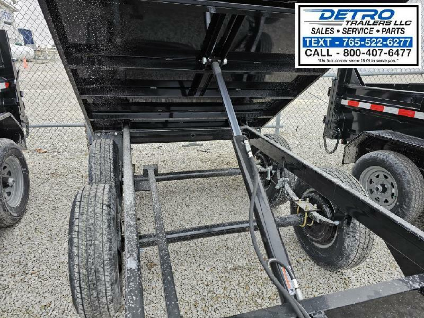 New 2024 Sure-Trac 6' x 10' 10K Single Ram SD Deckover Dump Trailer