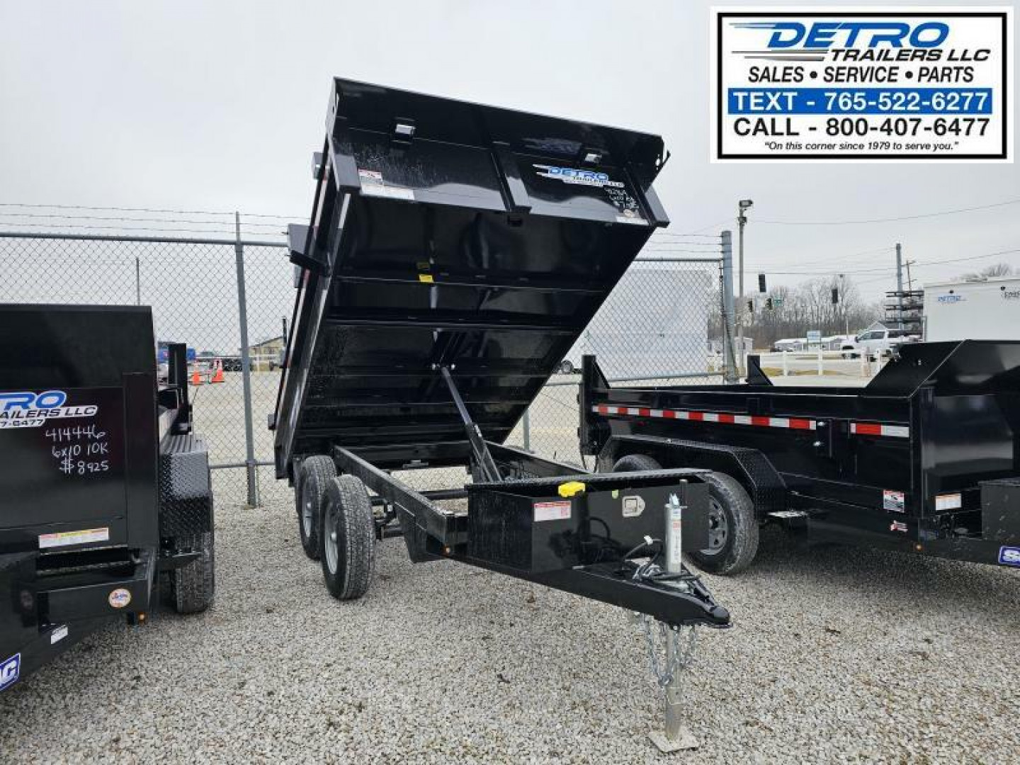 New 2024 Sure-Trac 6' x 10' 10K Single Ram SD Deckover Dump Trailer