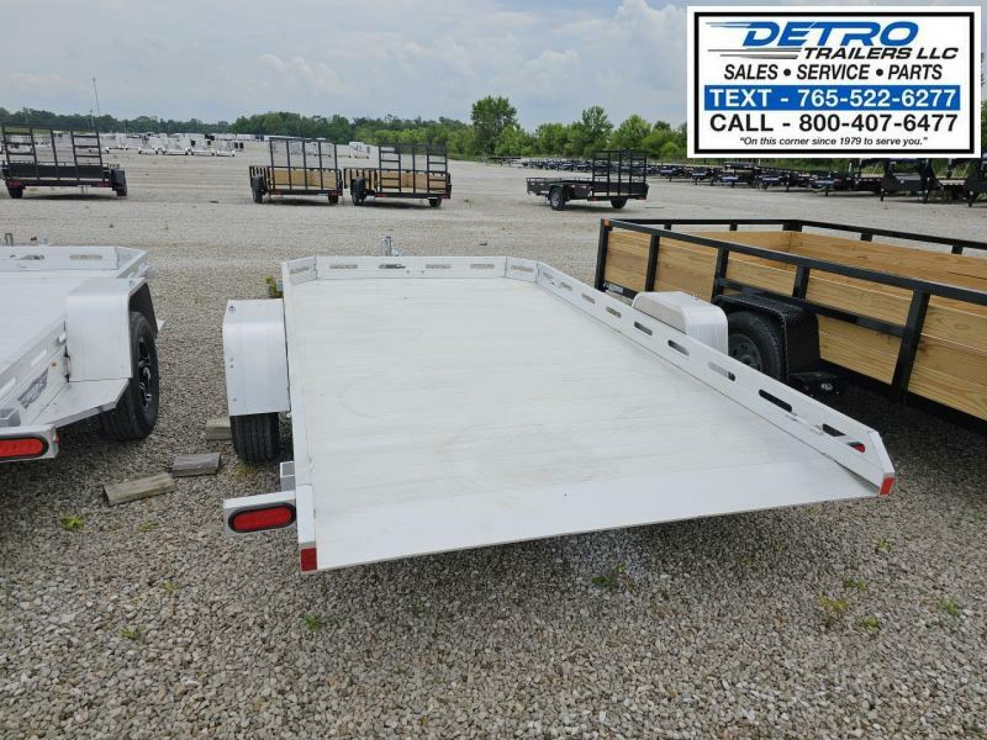 New 2025 Aluma 7712H-TILT-S 3K Torsion Tilt Utility Trailer
