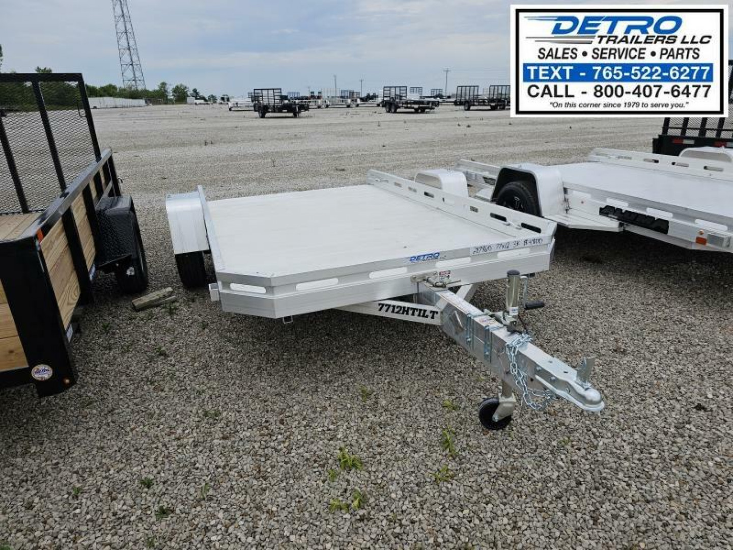 New 2025 Aluma 7712H-TILT-S 3K Torsion Tilt Utility Trailer