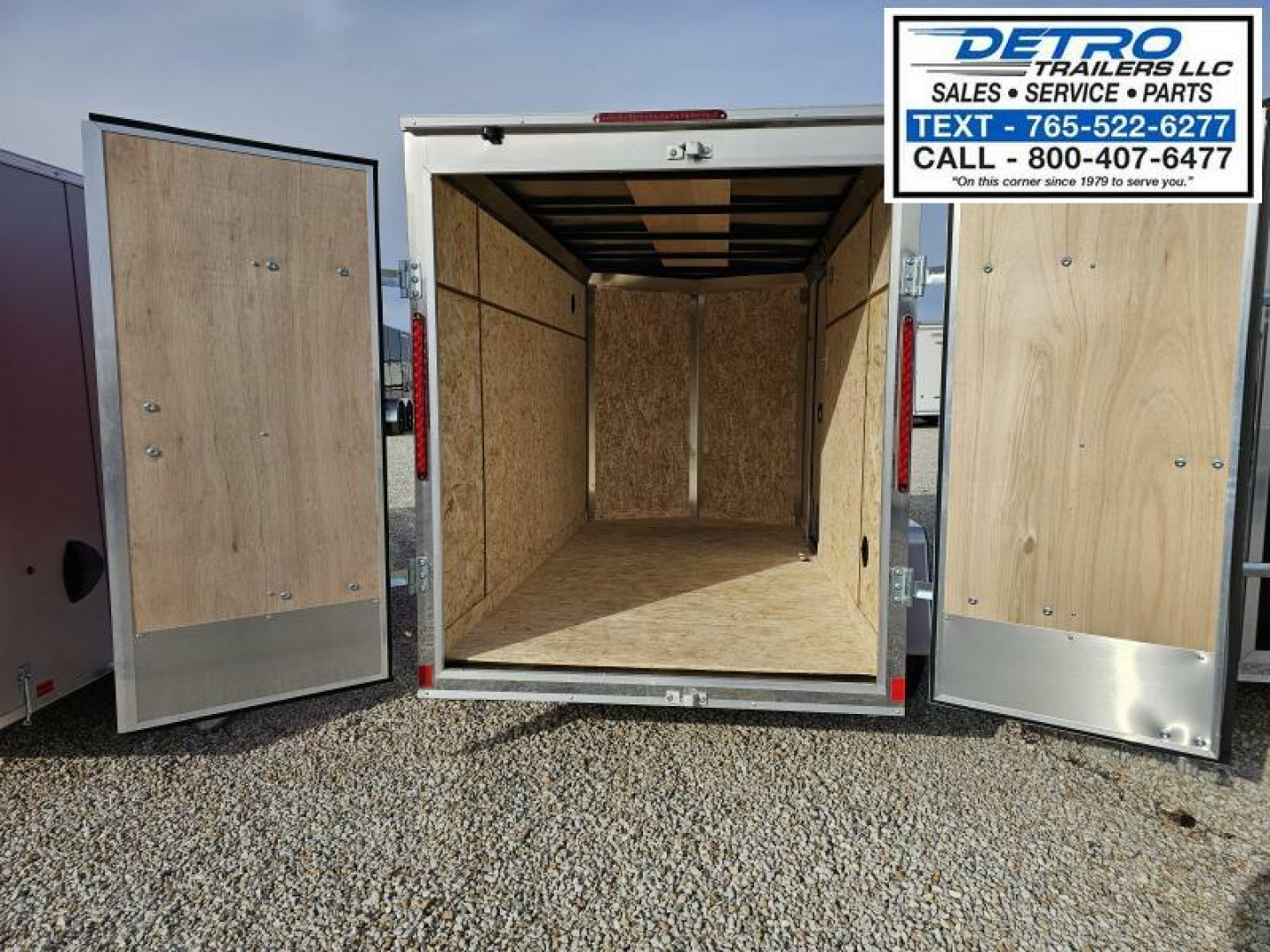 New 2025 BRIGHT RED Cargo Express EX DLX 5' x 10' 3K Idler V-nose Double Rear Door Enclosed Cargo Trailer