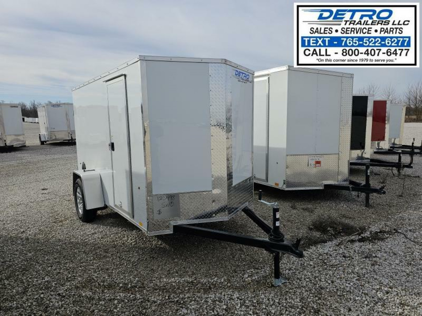 New 2025 Cargo Express EX DLX 5' x 10' 3K Idler Ramp Door V-nose Enclosed Cargo Trailer