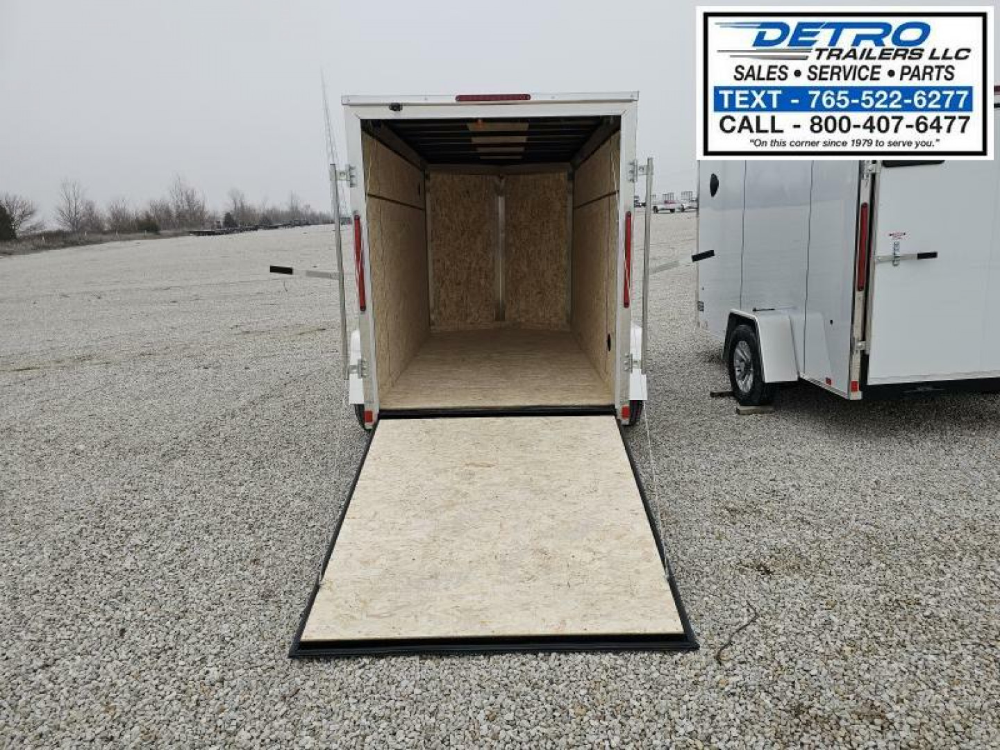 New 2025 Cargo Express EX DLX 5' x 10' 3K Idler Ramp Door V-nose Enclosed Cargo Trailer
