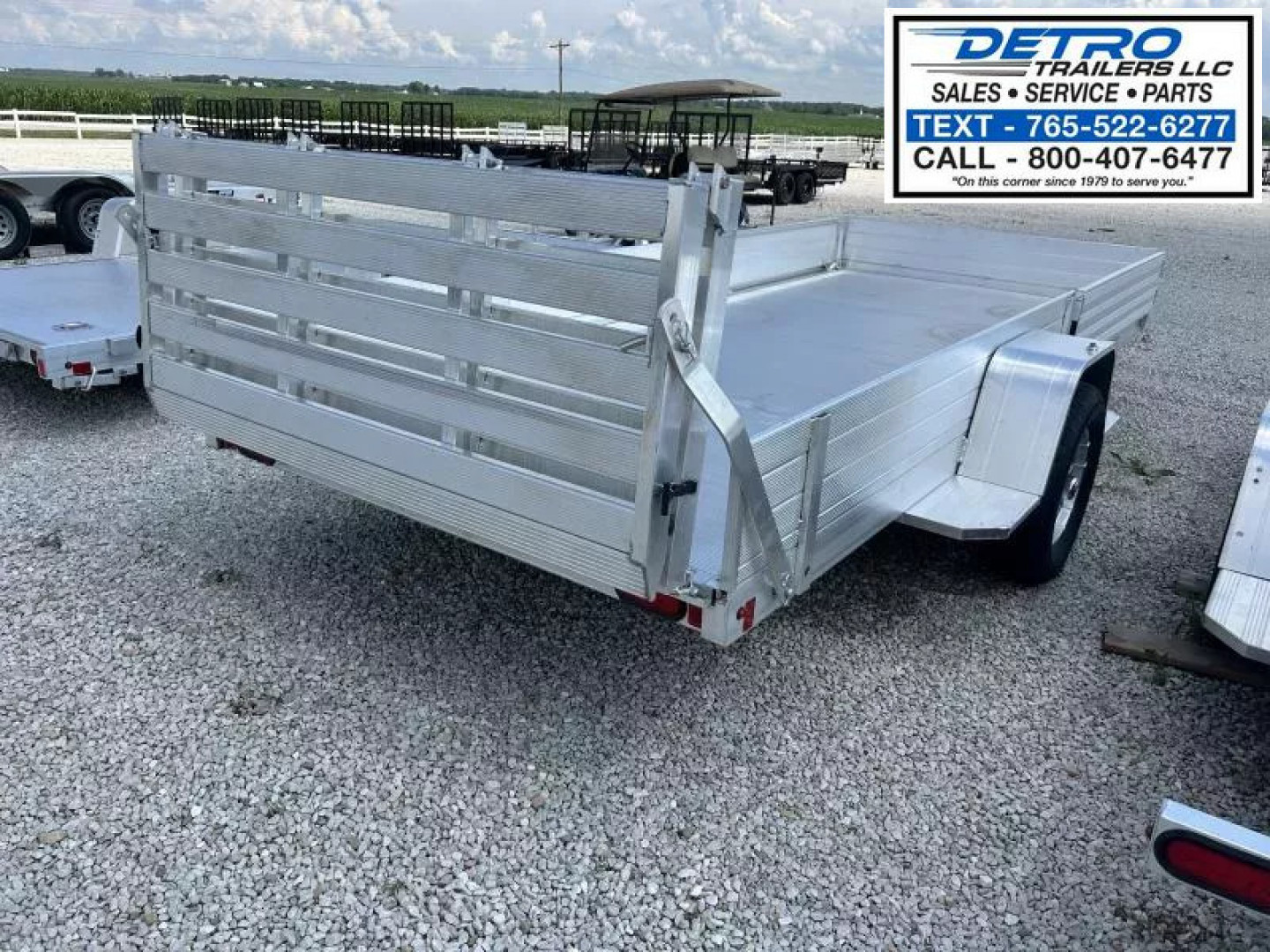 New 2026 Aluma 7214H 4.2K Torsion Idler Side Ramp Utility Trailer
