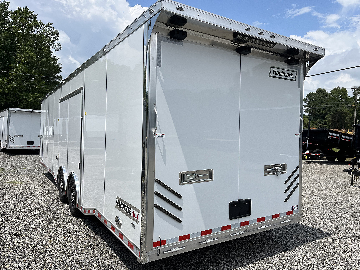 New 2025 Haulmark 32 EDGE ALUMINUM Race Trailer, Sportsman Plus PKG, Premium Escape Door, White PolyCor, 14K GVWR