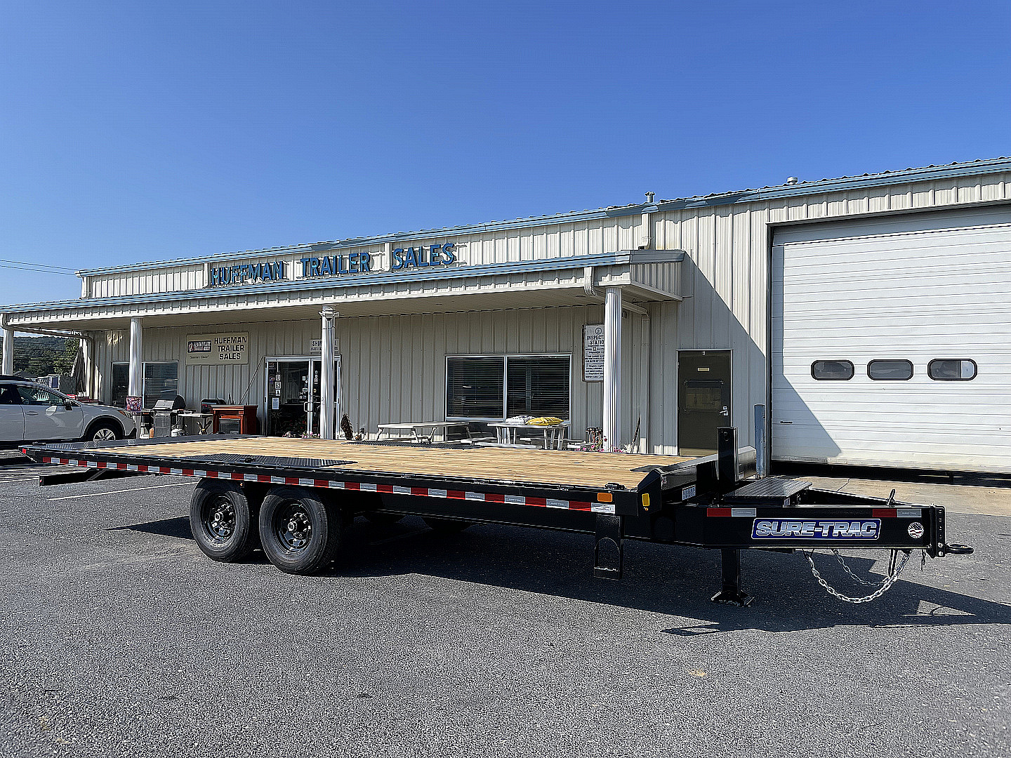 New 2025 Sure-Trac 102"x22' Deckover Power Tilt Equipment Trailer with Hydraulic Jack
