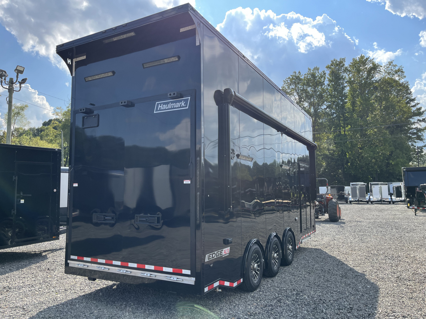 New 2025 Haulmark 24' EDGE ALUMINUM Stacker Race Trailer, Blackout Package, Premium Escape Door
