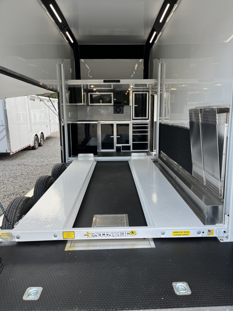 New 2025 Haulmark 24' EDGE ALUMINUM Stacker Race Trailer, Blackout Package, Premium Escape Door