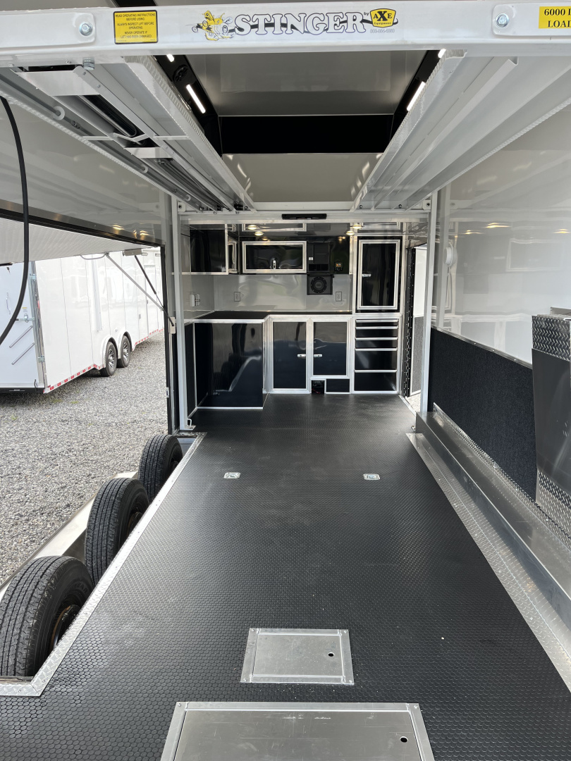 New 2025 Haulmark 24' EDGE ALUMINUM Stacker Race Trailer, Blackout Package, Premium Escape Door