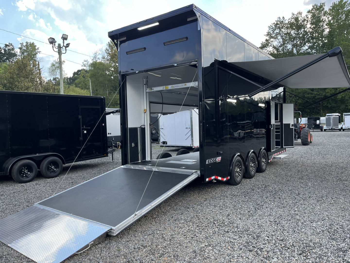 New 2025 Haulmark 24' EDGE ALUMINUM Stacker Race Trailer, Blackout Package, Premium Escape Door