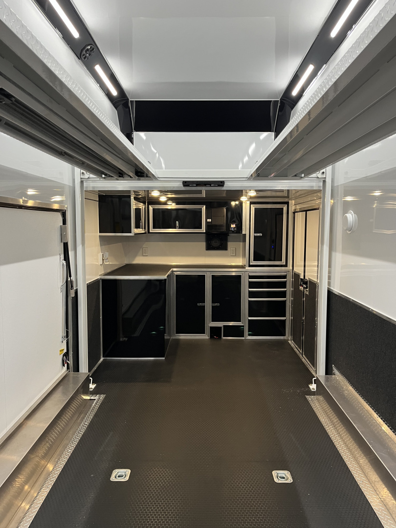 New 2025 Haulmark 24' EDGE ALUMINUM Stacker Race Trailer, Blackout Package, Premium Escape Door