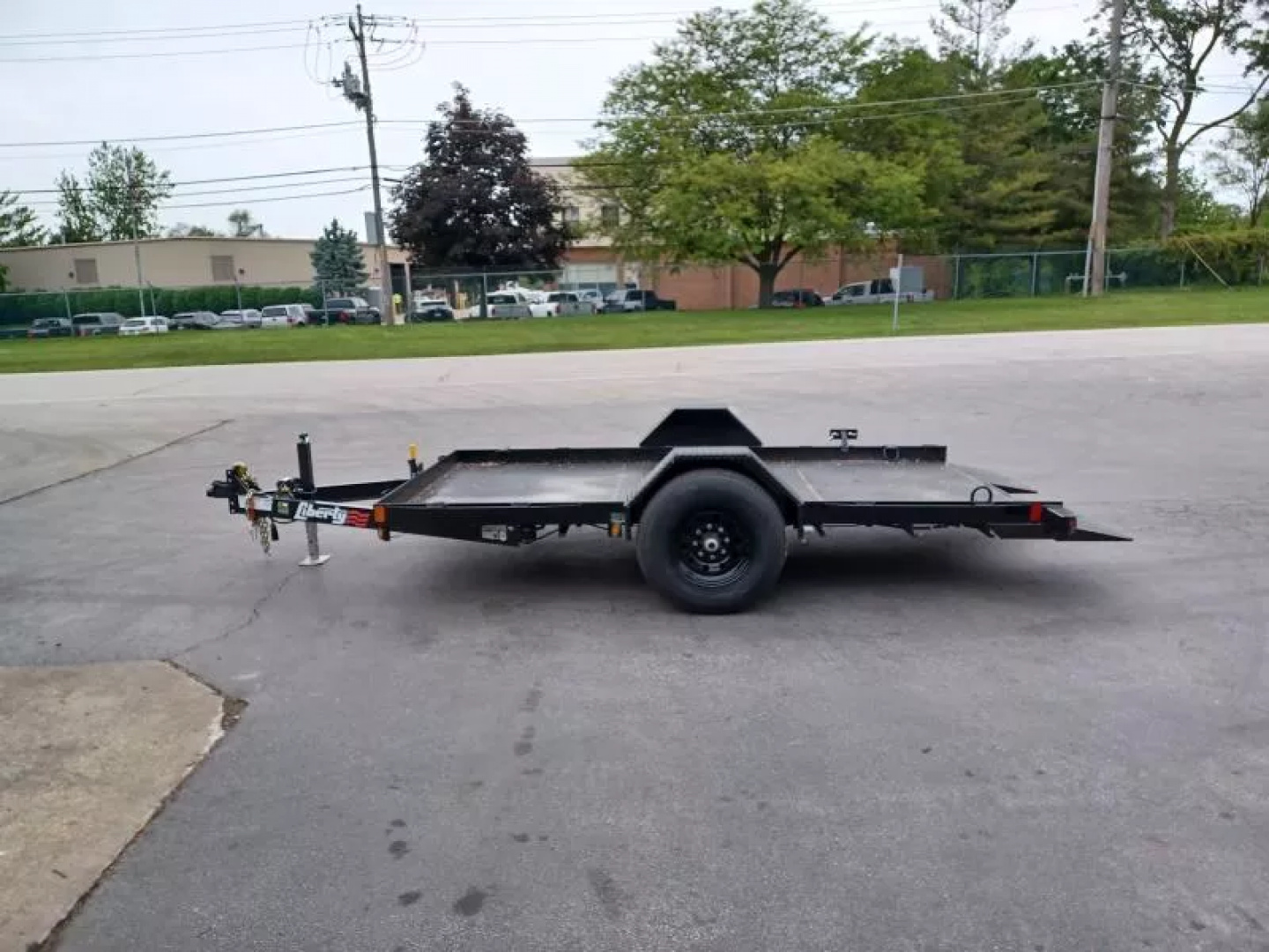 New 79"X12' 7K TILT TRAILER WITH STEEL FLOOR