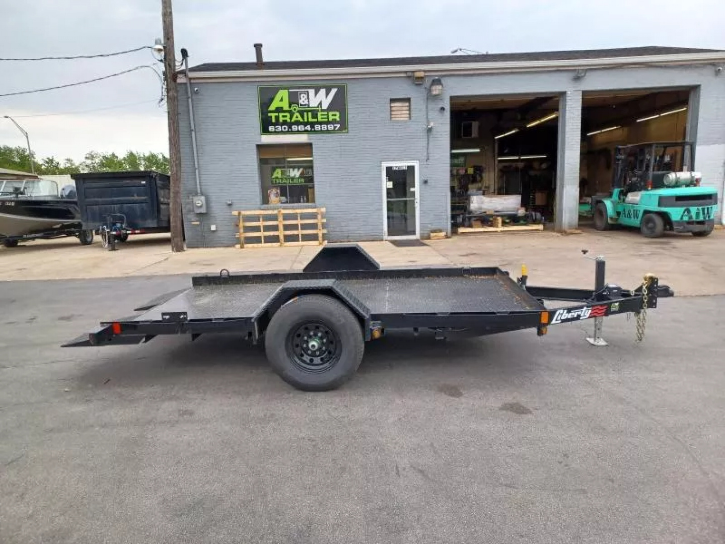 New 79"X12' 7K TILT TRAILER WITH STEEL FLOOR