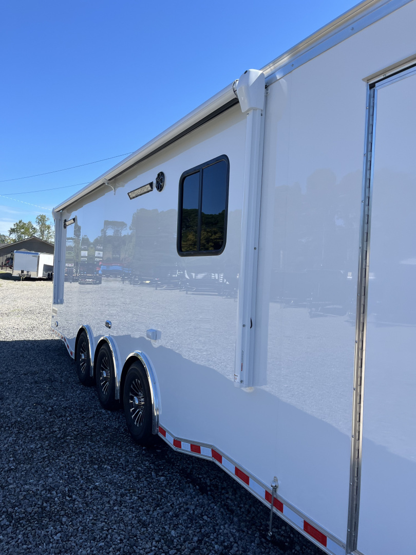 New 2026 Haulmark 34 Bathoom Race Trailer, Air Prep PKG, Awning, Polycor, Insulated, Window, 54" ALX Slide Out Step, A/C + Heat