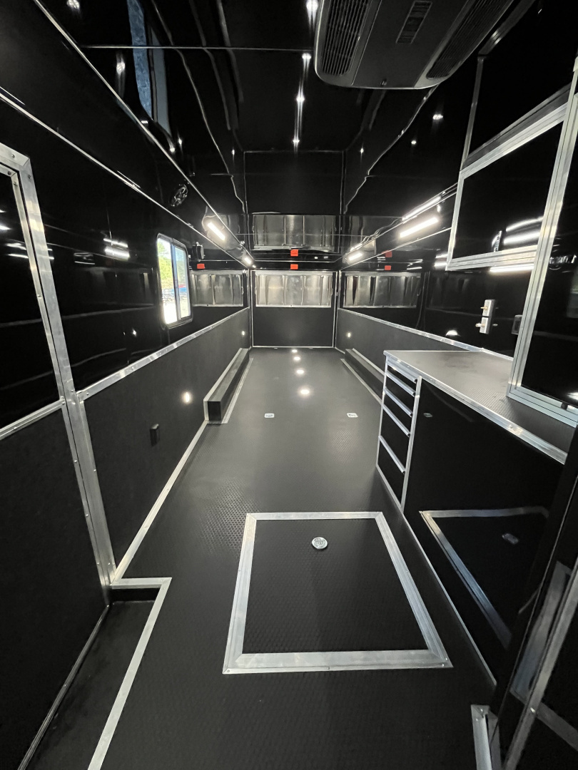 New 2026 Haulmark 34 Bathoom Race Trailer, Air Prep PKG, Awning, Polycor, Insulated, Window, 54" ALX Slide Out Step, A/C + Heat