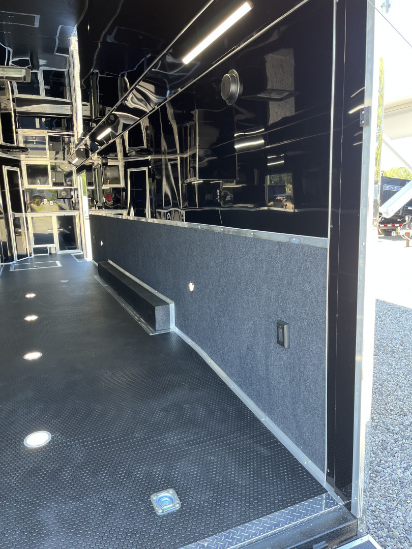 New 2026 Haulmark 34 Bathoom Race Trailer, Air Prep PKG, Awning, Polycor, Insulated, Window, 54" ALX Slide Out Step, A/C + Heat