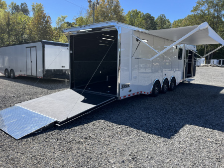 New 2026 Haulmark 34 Bathoom Race Trailer, Air Prep PKG, Awning, Polycor, Insulated, Window, 54" ALX Slide Out Step, A/C + Heat