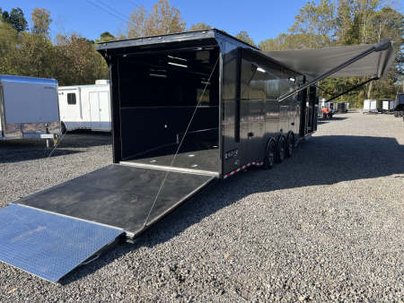 New 2026 Haulmark 34 Bathoom Race Trailer, Air Prep PKG, Awning, Polycor, Insulated, Window, 54" ALX Slide Out Step, A/C + Heat