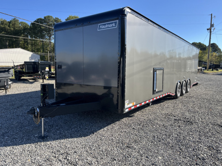 New 2026 Haulmark 34 Bathoom Race Trailer, Air Prep PKG, Awning, Polycor, Insulated, Window, 54" ALX Slide Out Step, A/C + Heat