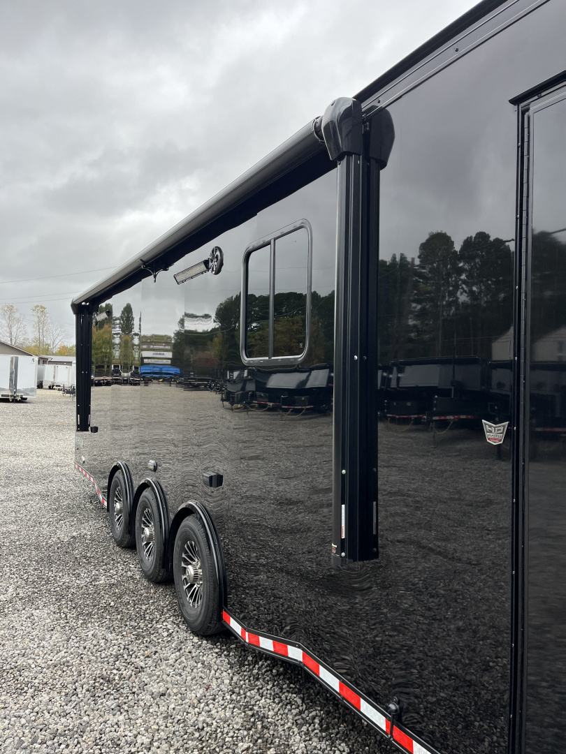 New 2026 Haulmark 34 Bathoom Race Trailer, Air Prep PKG, Awning, Polycor, Insulated, Window, 54" ALX Slide Out Step, A/C + Heat