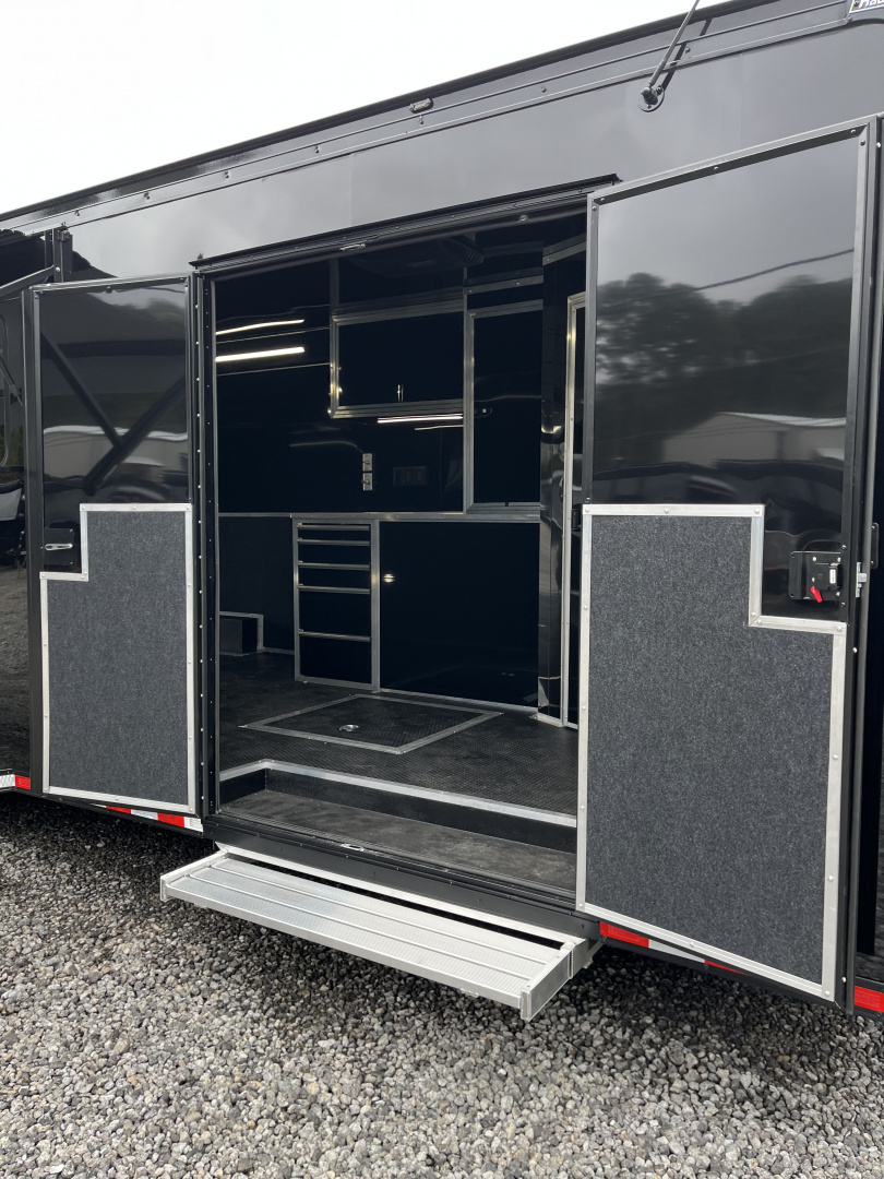 New 2026 Haulmark 34 Bathoom Race Trailer, Air Prep PKG, Awning, Polycor, Insulated, Window, 54" ALX Slide Out Step, A/C + Heat