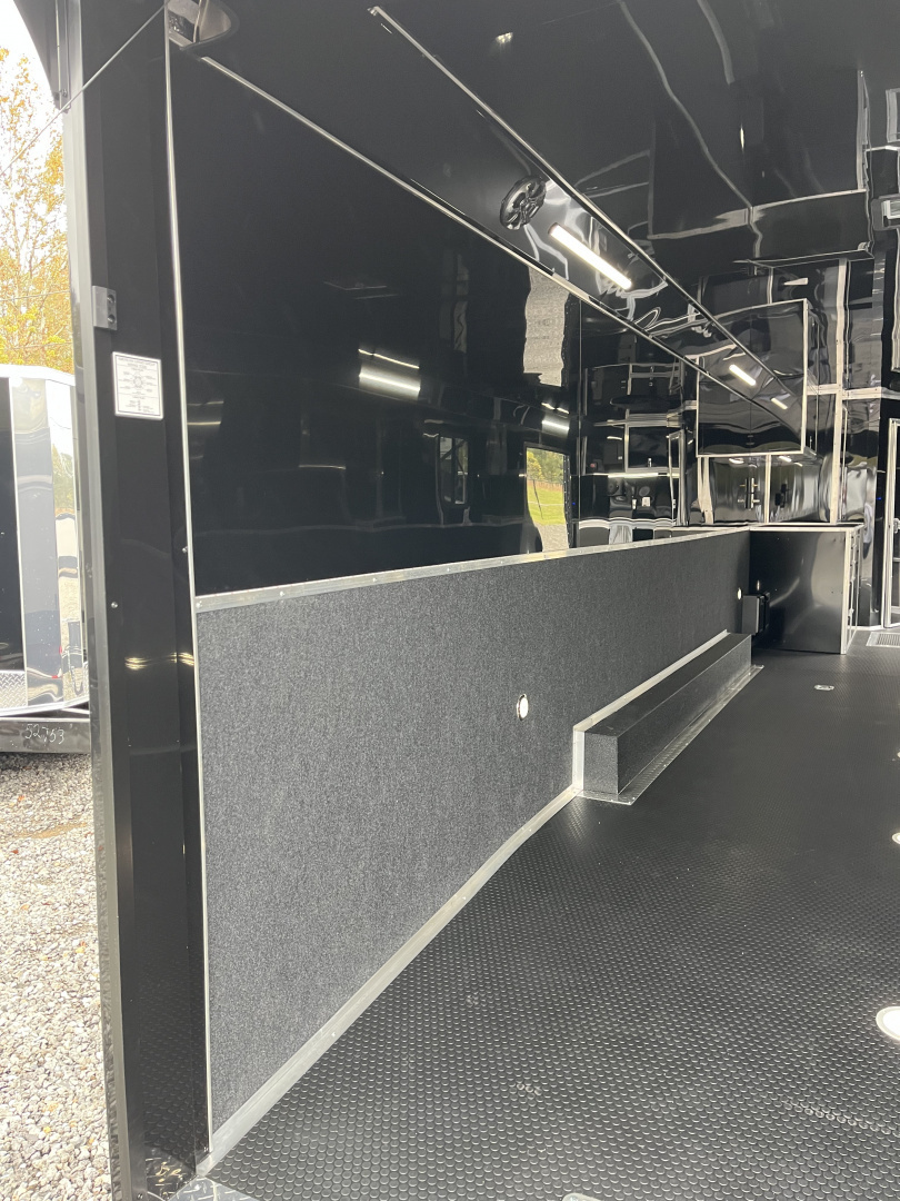 New 2026 Haulmark 34 Bathoom Race Trailer, Air Prep PKG, Awning, Polycor, Insulated, Window, 54" ALX Slide Out Step, A/C + Heat