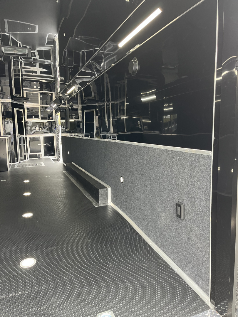 New 2026 Haulmark 34 Bathoom Race Trailer, Air Prep PKG, Awning, Polycor, Insulated, Window, 54" ALX Slide Out Step, A/C + Heat