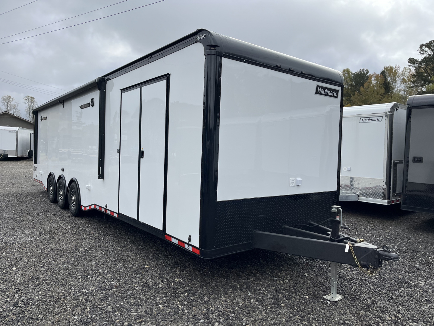 New 2026 Haulmark EDGE 34 Race Trailer With Turbo Package, Awning, Polycor, Insulated, Black Trim Package