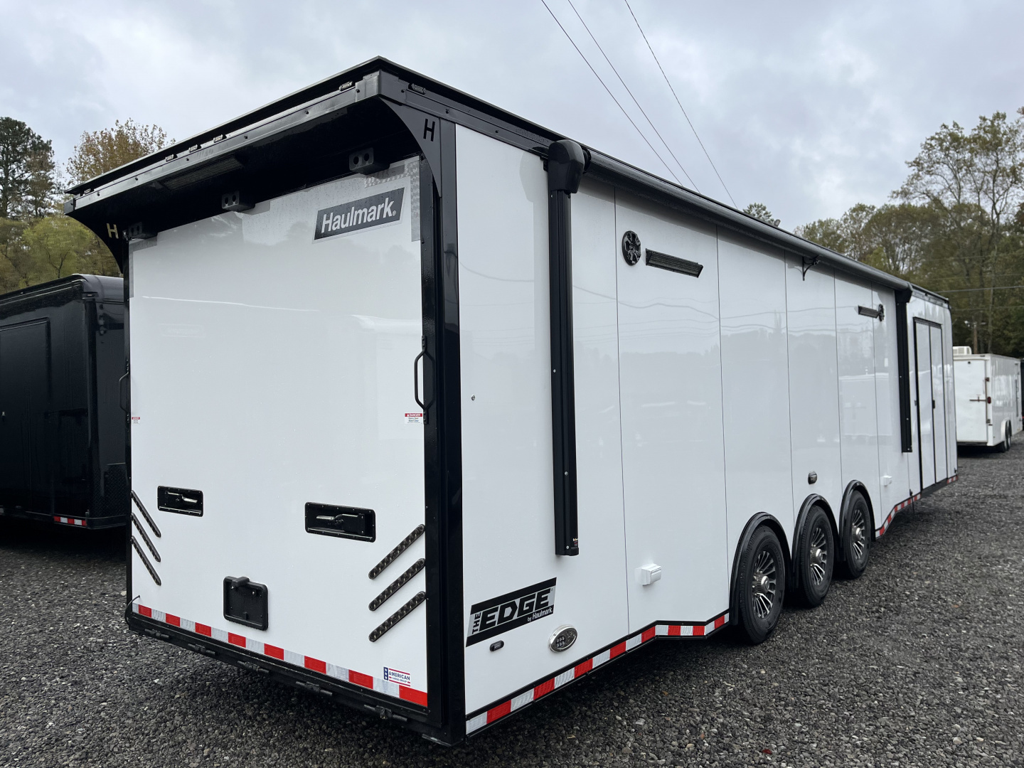 New 2026 Haulmark EDGE 34 Race Trailer With Turbo Package, Awning, Polycor, Insulated, Black Trim Package