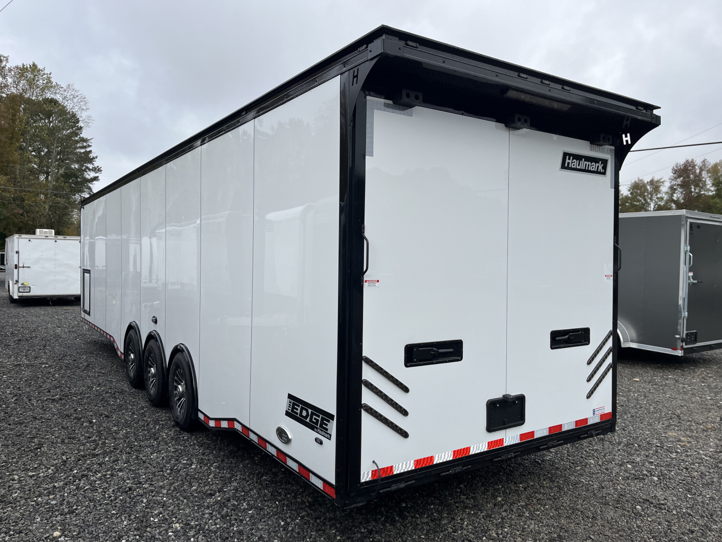 New 2026 Haulmark EDGE 34 Race Trailer With Turbo Package, Awning, Polycor, Insulated, Black Trim Package