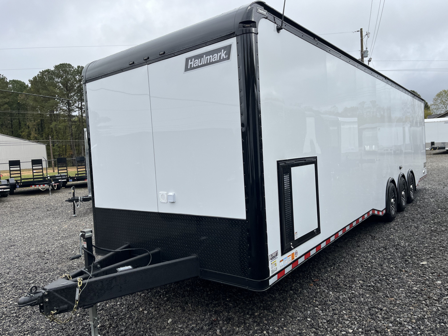 New 2026 Haulmark EDGE 34 Race Trailer With Turbo Package, Awning, Polycor, Insulated, Black Trim Package