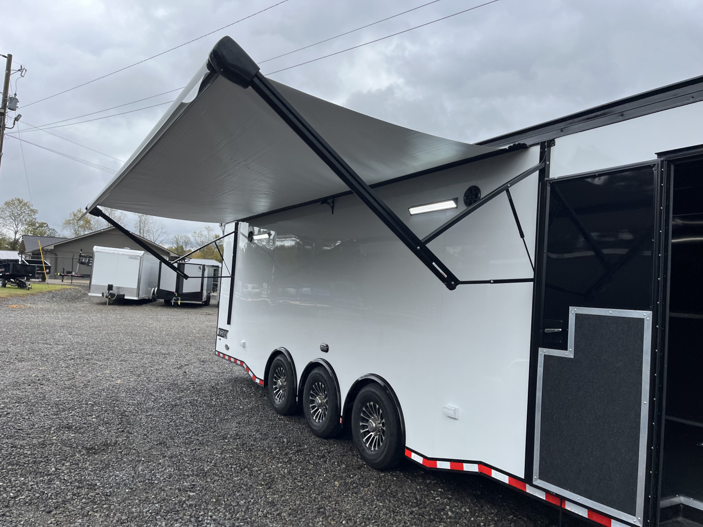 New 2026 Haulmark EDGE 34 Race Trailer With Turbo Package, Awning, Polycor, Insulated, Black Trim Package