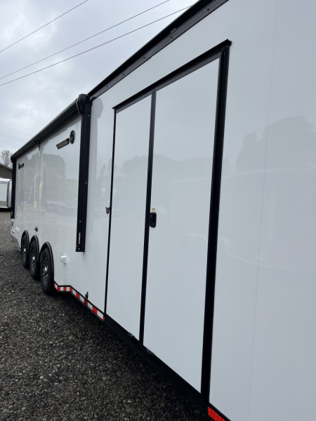 New 2026 Haulmark EDGE 34 Race Trailer With Turbo Package, Awning, Polycor, Insulated, Black Trim Package