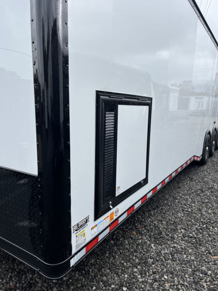 New 2026 Haulmark EDGE 34 Race Trailer With Turbo Package, Awning, Polycor, Insulated, Black Trim Package