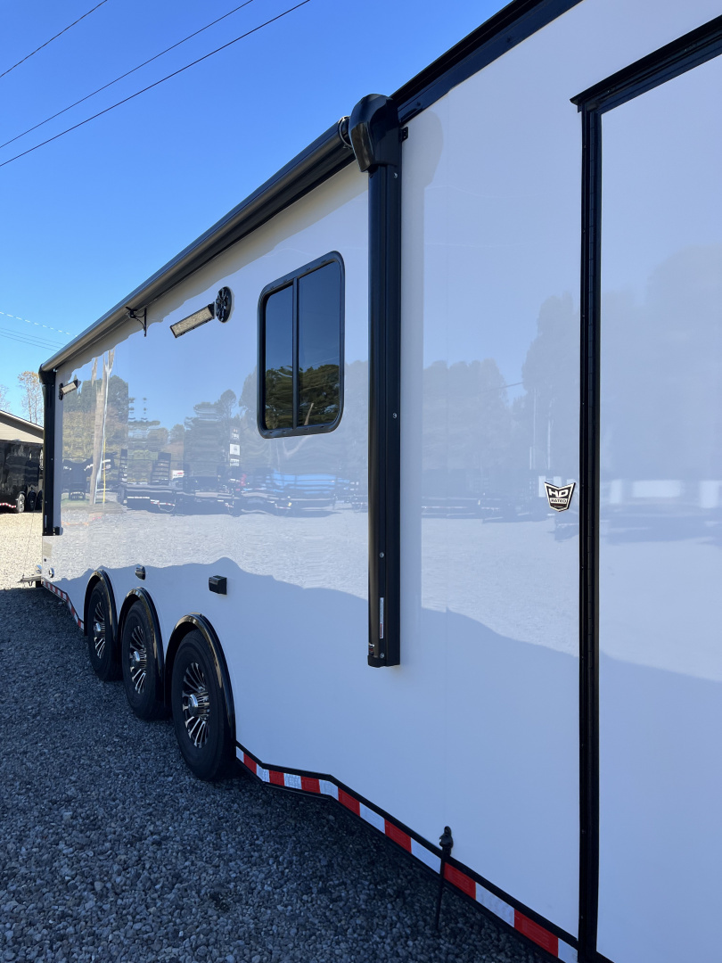 New 2026 Haulmark 34 Bathoom Race Trailer, Air Prep PKG, Awning, Polycor, Insulated, Window, 54" ALX Slide Out Step, A/C + Heat