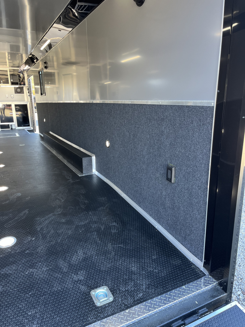 New 2026 Haulmark 34 Bathoom Race Trailer, Air Prep PKG, Awning, Polycor, Insulated, Window, 54" ALX Slide Out Step, A/C + Heat