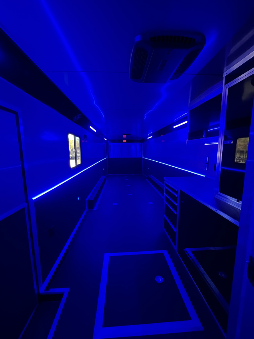 New 2026 Haulmark 34 Bathoom Race Trailer, Air Prep PKG, Awning, Polycor, Insulated, Window, 54" ALX Slide Out Step, A/C + Heat